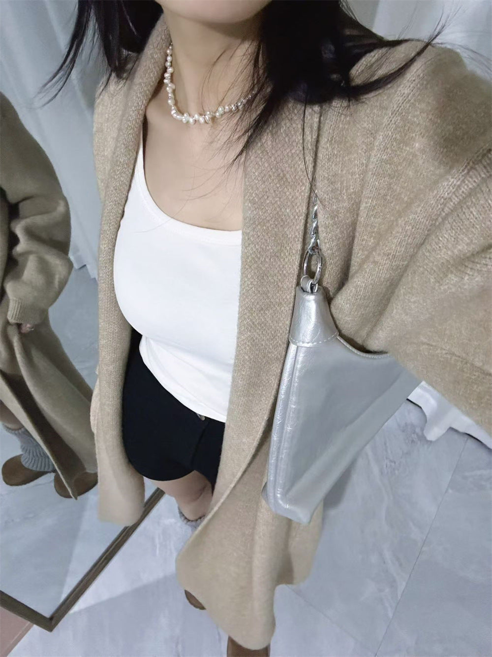Loose solid color medium length sweater
