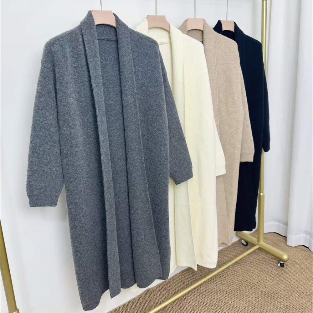 Loose solid color medium length sweater