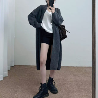 Loose solid color medium length sweater
