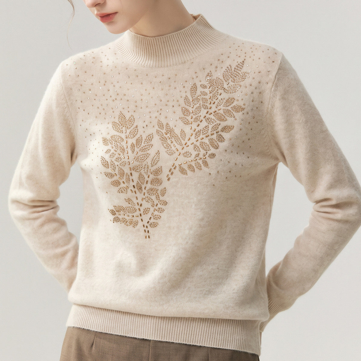 Half high neck sweater with leaf pattern