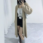 Loose solid color medium length sweater