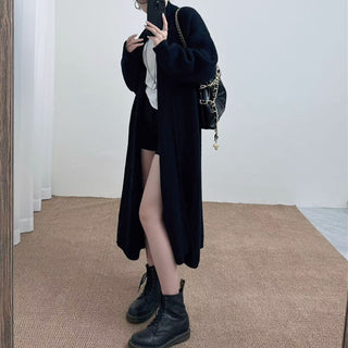 Loose solid color medium length sweater