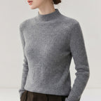 Half high neck solid color sweater
