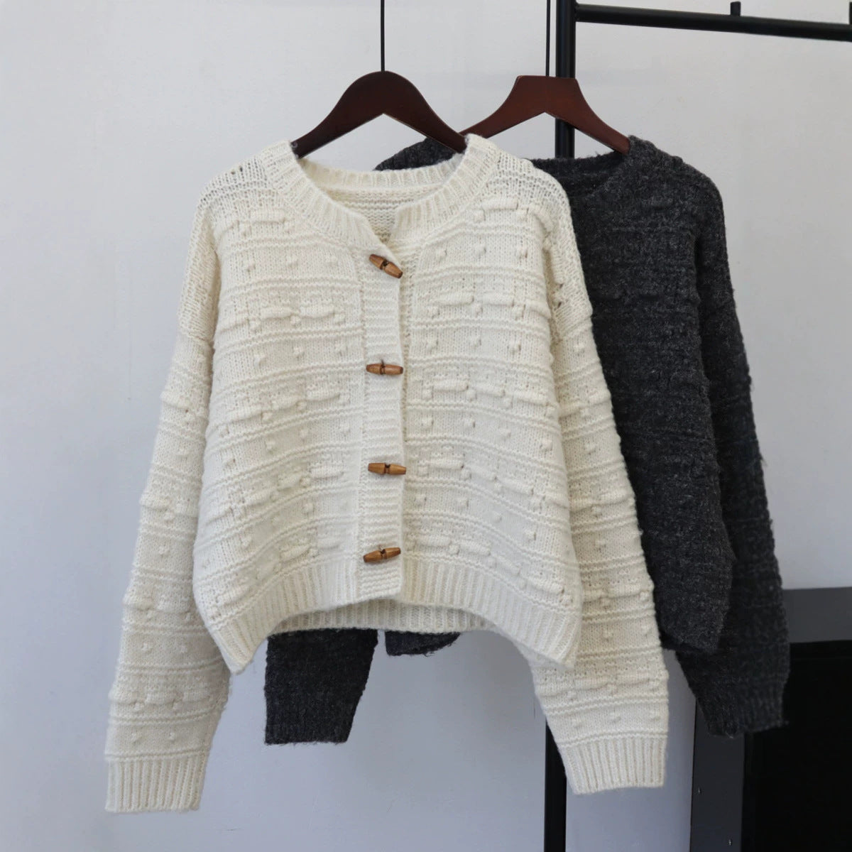 Bull horn button long sleeved sweater