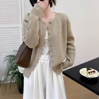 Solid color round neck sweater for women